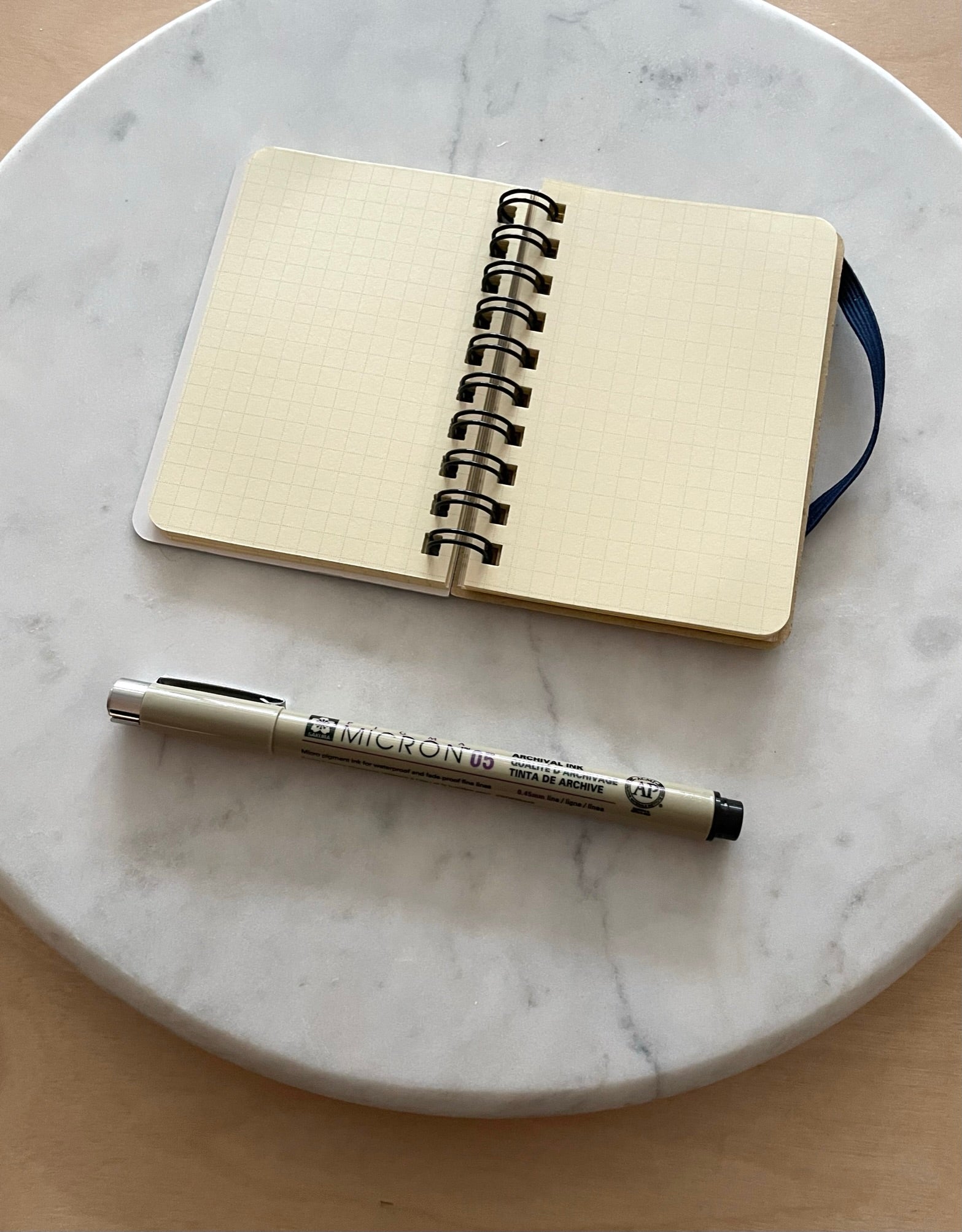 delfonics Rollbahn Spiral Notebook (mini memo) graph paper micron black pen