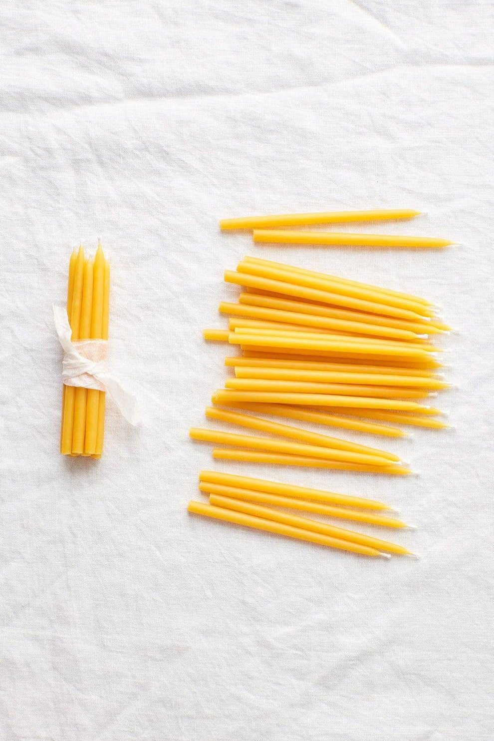 waxing moon Beeswax Birthday Candles, pack of 10 tied in cloth